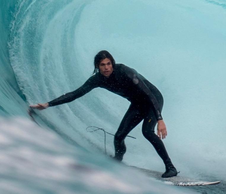 A person surfing an ocean wave 